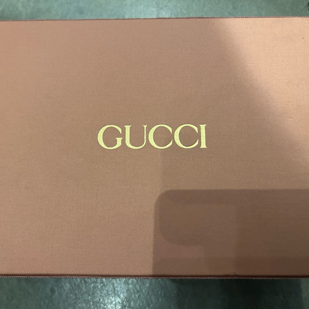 GUCCI Blush Satin Box with Gold Logo and intricate details trimmed around